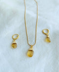 Golden Drip Citrine Jewellery Set with natural yellow citrine pendant necklace and matching 18K gold-plated drop earrings.