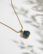Raw labradorite gold pendant necklace close-up