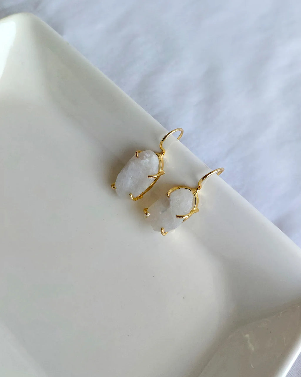 Raw white stone gold hook earrings