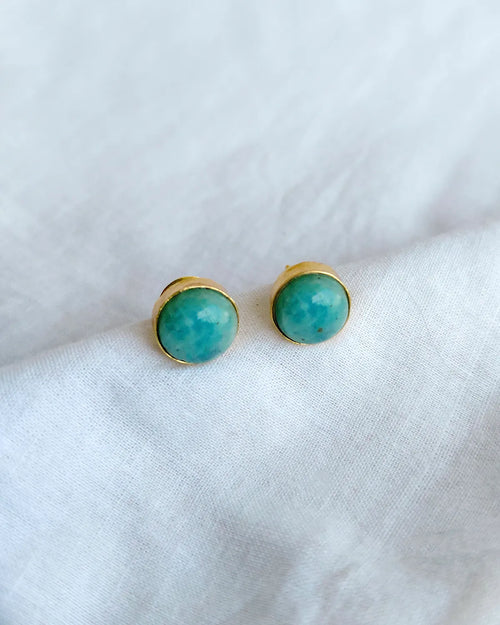 Turquoise blue round gold stud earrings by Solmist Muse – view 1