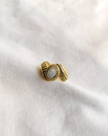 Front view gold-tone leaf vintage ring with oval grey stone