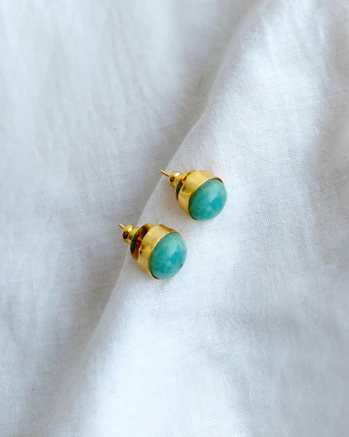 Turquoise blue round gold stud earrings by Solmist Muse – view 2