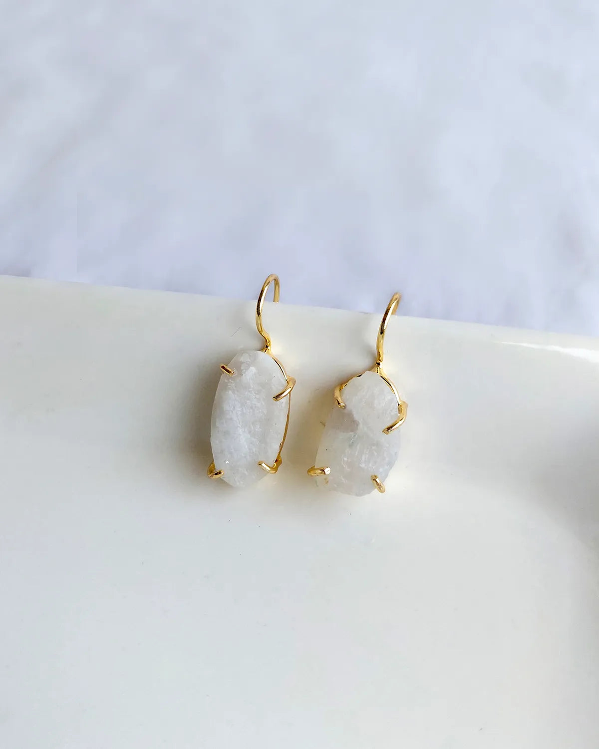 Raw white stone gold hook earrings