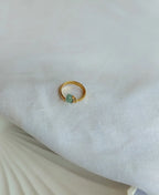 Sage Pebble Aventurine 18K Gold Plated Ring with small natural green gemstone and adjustable gold band.