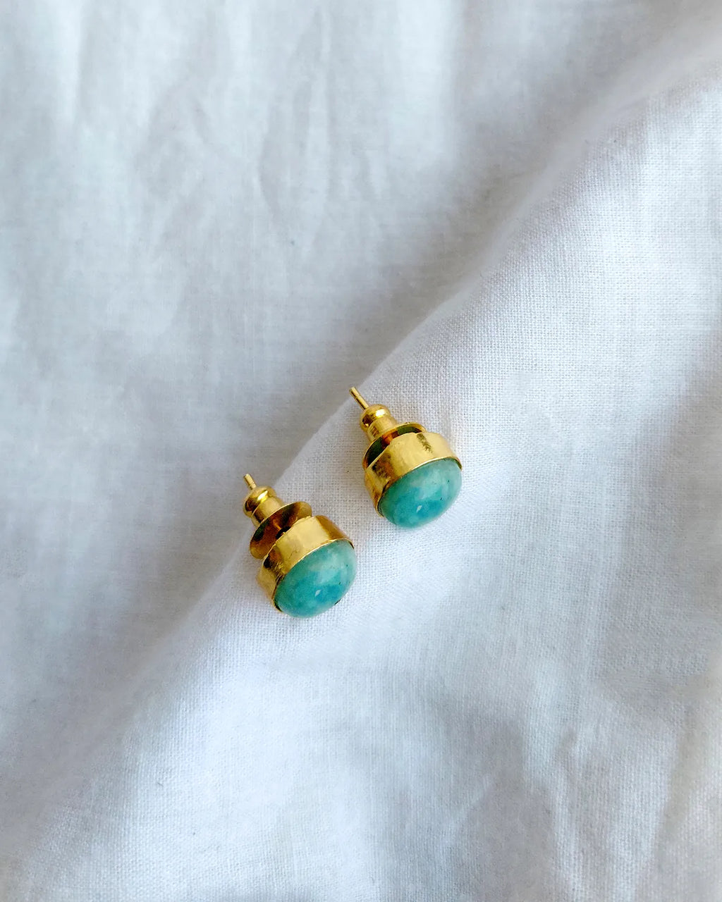Turquoise blue round gold stud earrings by Solmist Muse – view 3
