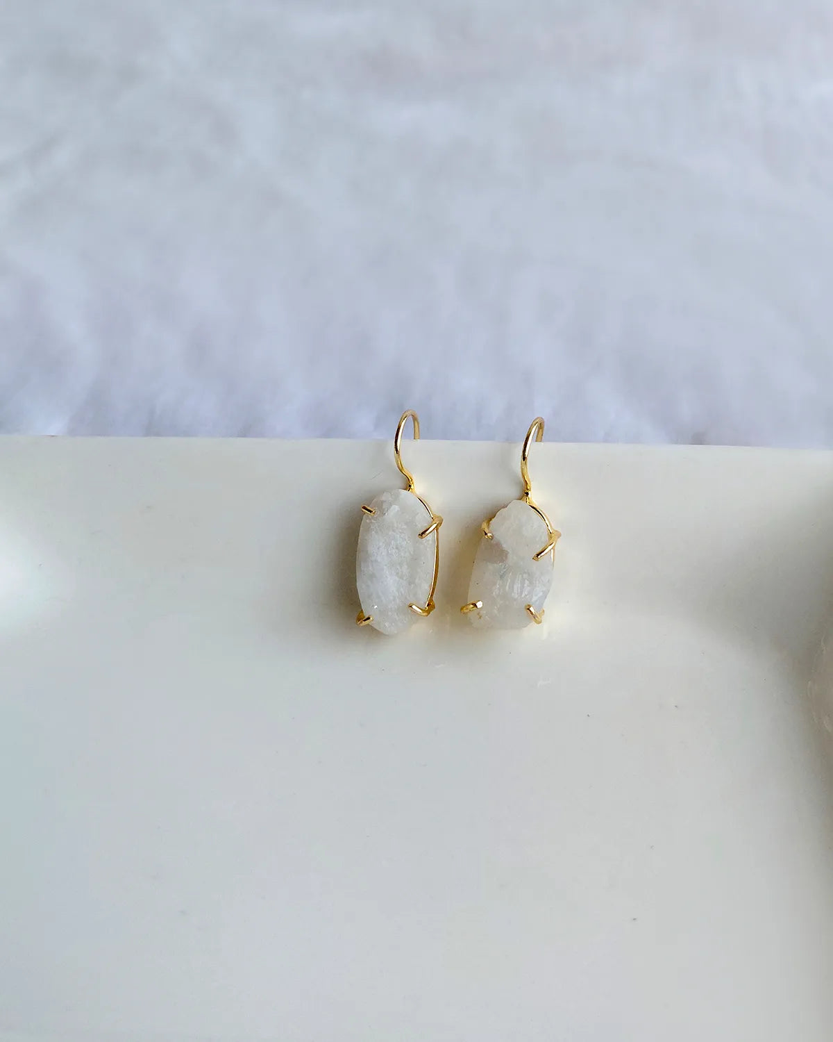 Raw white stone gold hook earrings