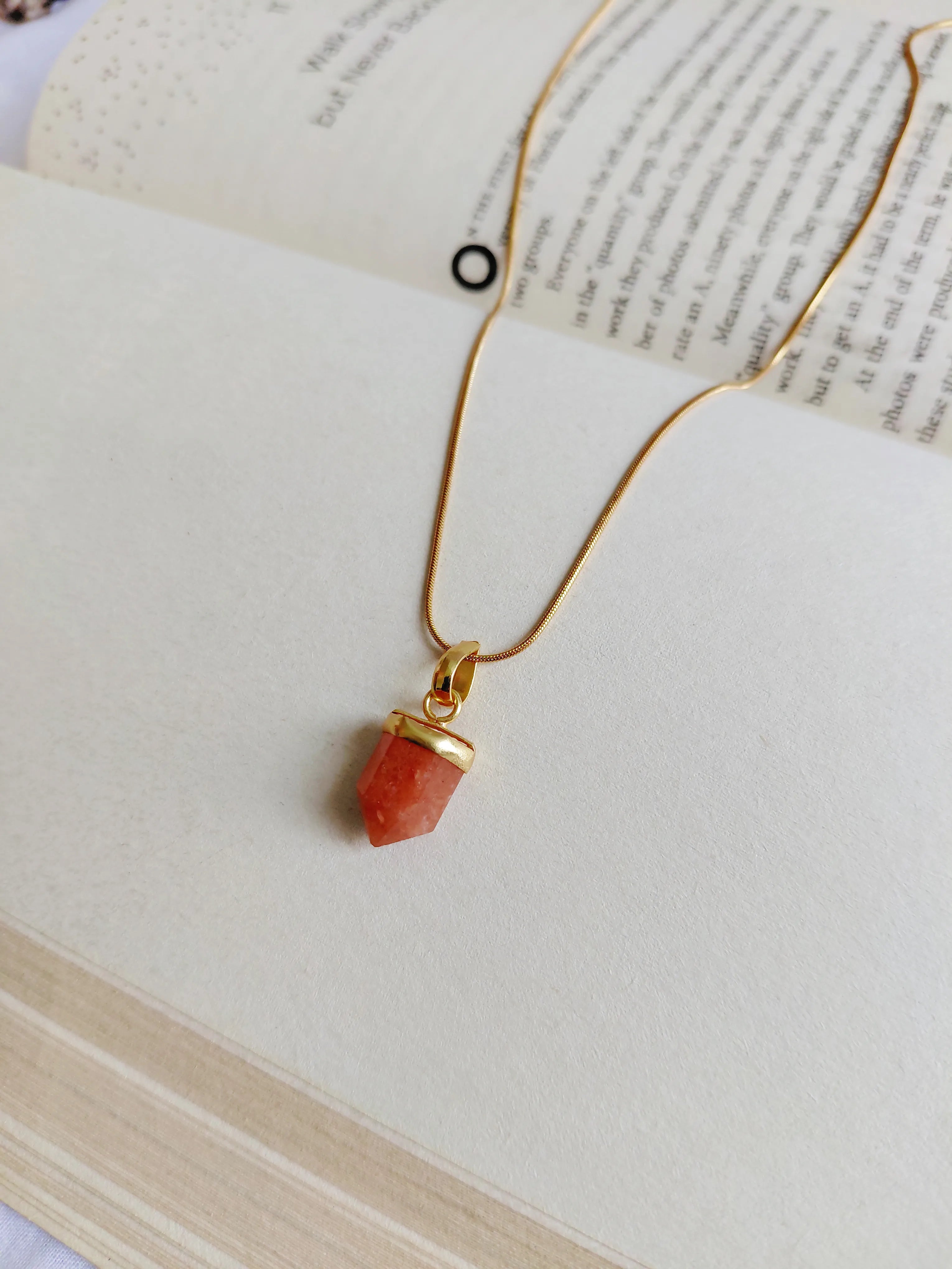 Carnelian gemstone pointed pendant necklace with gold-plated chain