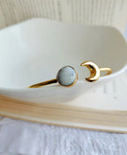 Gold-plated adjustable ring with White Howlite stone and crescent moon