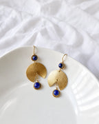 Lapis Lazuli gold fan drop earrings on white dish