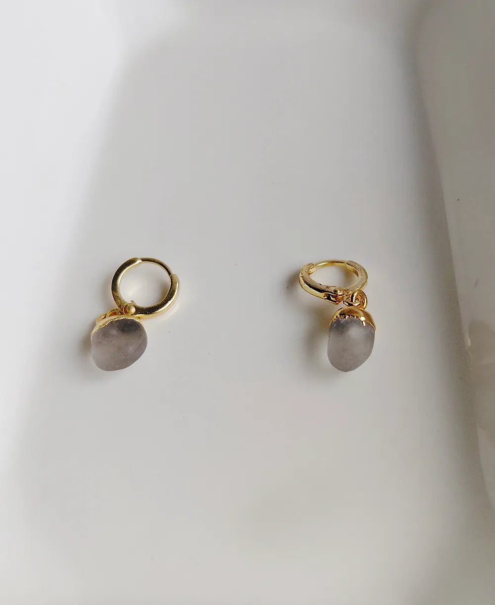 Handmade Clear Quartz necklace and earrings set with an elegant gold finish.