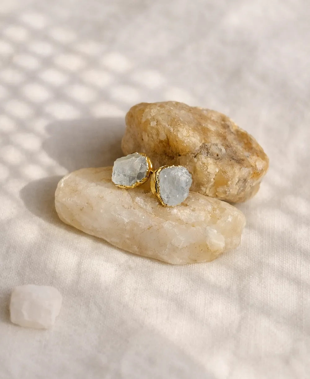Moon Pebble Moonstone Stud Earrings with raw milky moonstone gemstones and 18K gold-plated bezel setting.