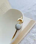 Natural White Howlite moon ring in an elegant gold finish