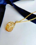 Honey Gold Citrine Wrap Necklace with natural raw citrine crystal and 18K gold-plated wire-wrapped pendant.