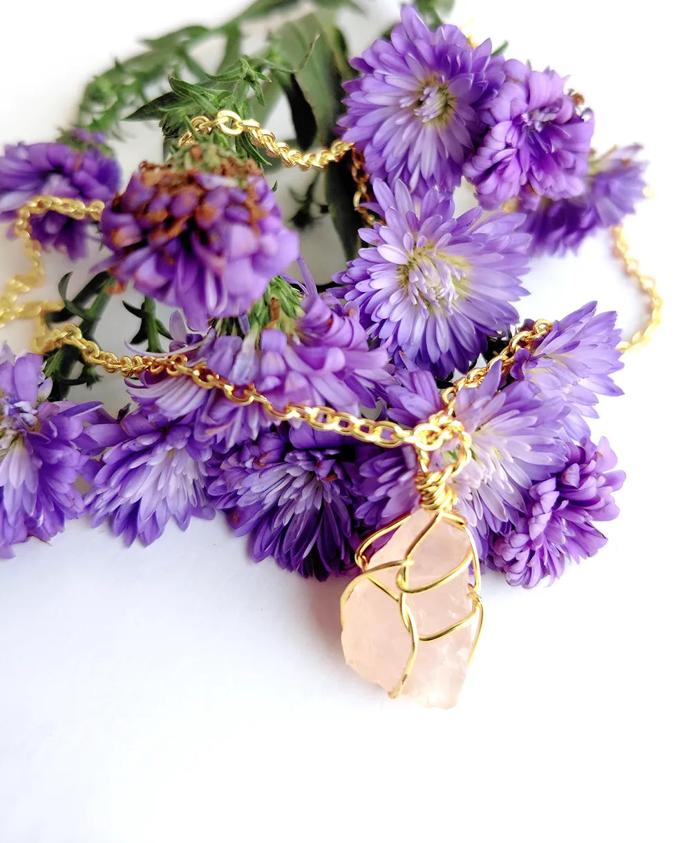 Rosewater Crystal Wrap Necklace with natural raw rose quartz crystal and 18K gold-plated wire-wrapped pendant.