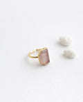 Rose Quartz Love Stone Adjustable Ring with soft pink natural gemstone and gold band on white background