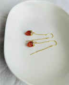Orange-red gemstone threader earrings with delicate gold finish