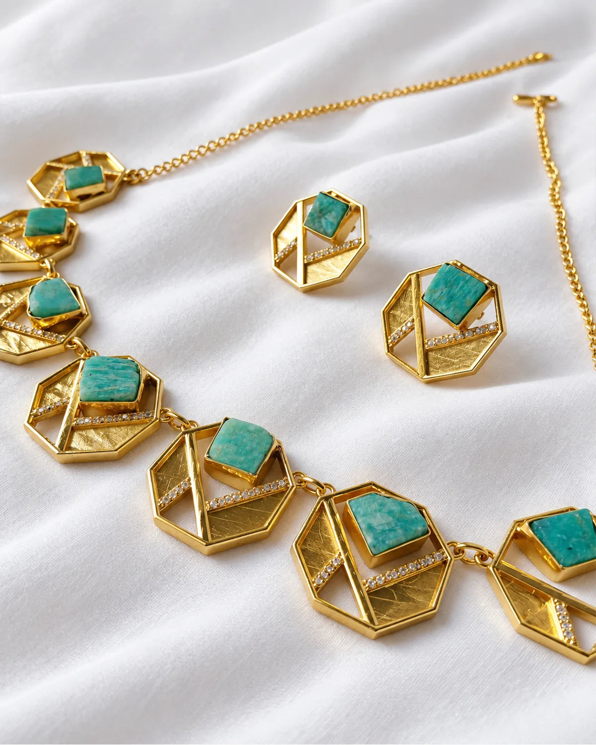 Amazonite necklace and earrings set on white fabric
