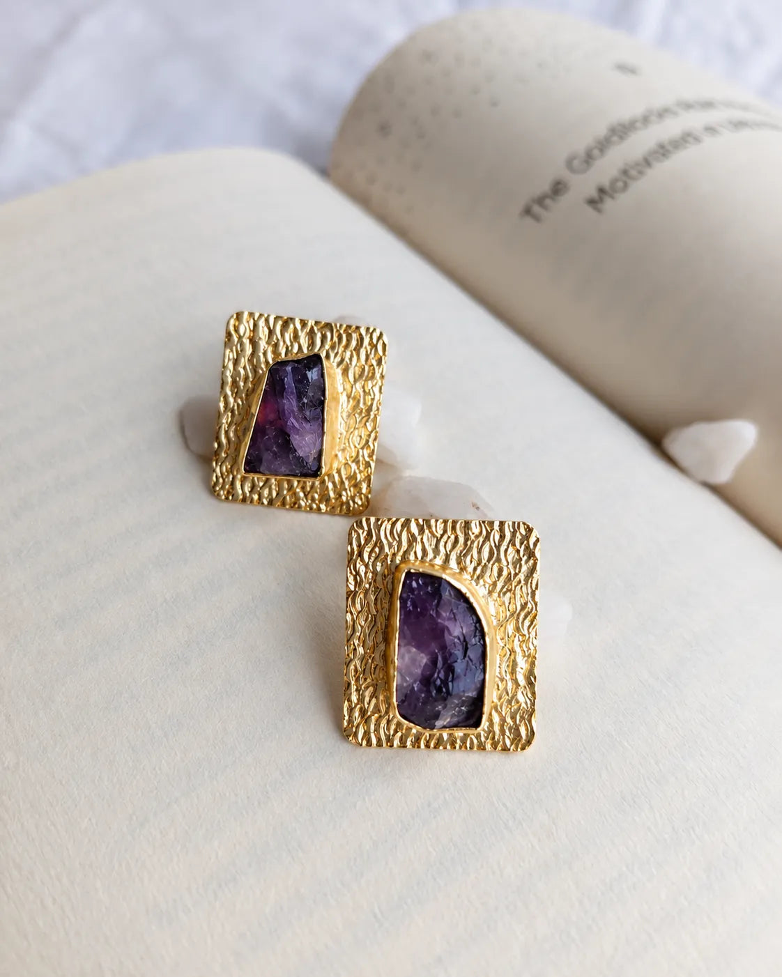 Amethyst gold stud earrings detail