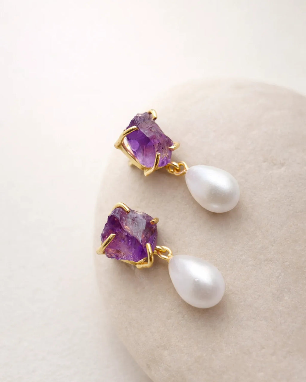 Amethyst and pearl drop earrings close-up