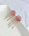 Blush pink gemstone gold-plated drop earrings front view