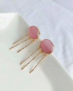 Blush pink gemstone gold-plated drop earrings front view