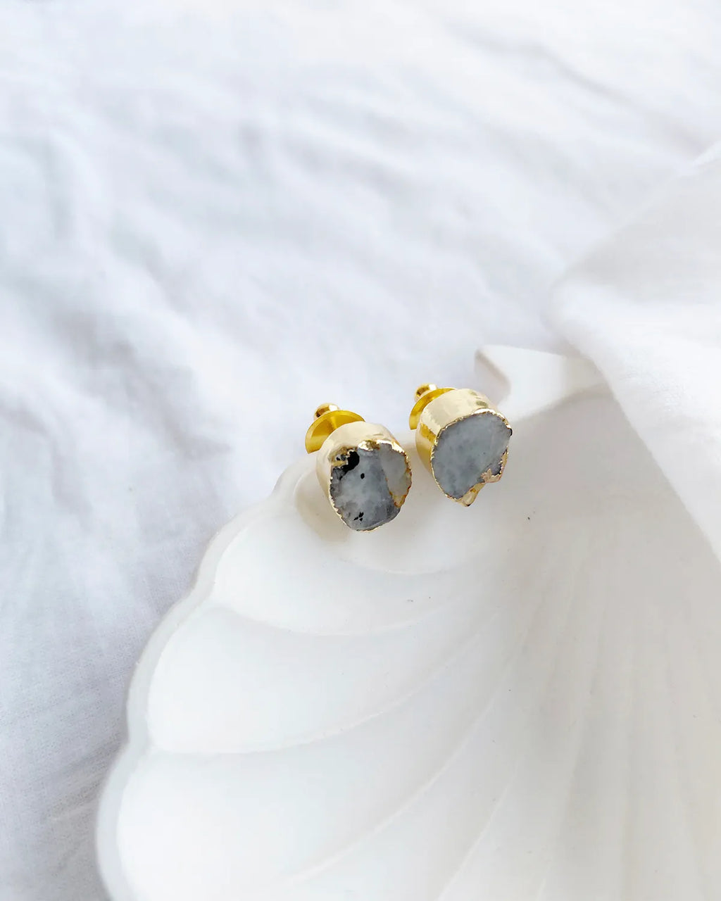 Natural grey stone gold stud earrings front