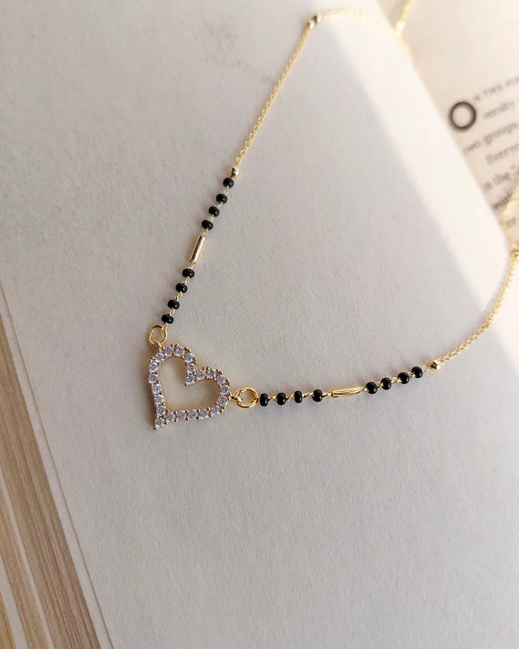 Sparkling heart pendant black bead mangalsutra