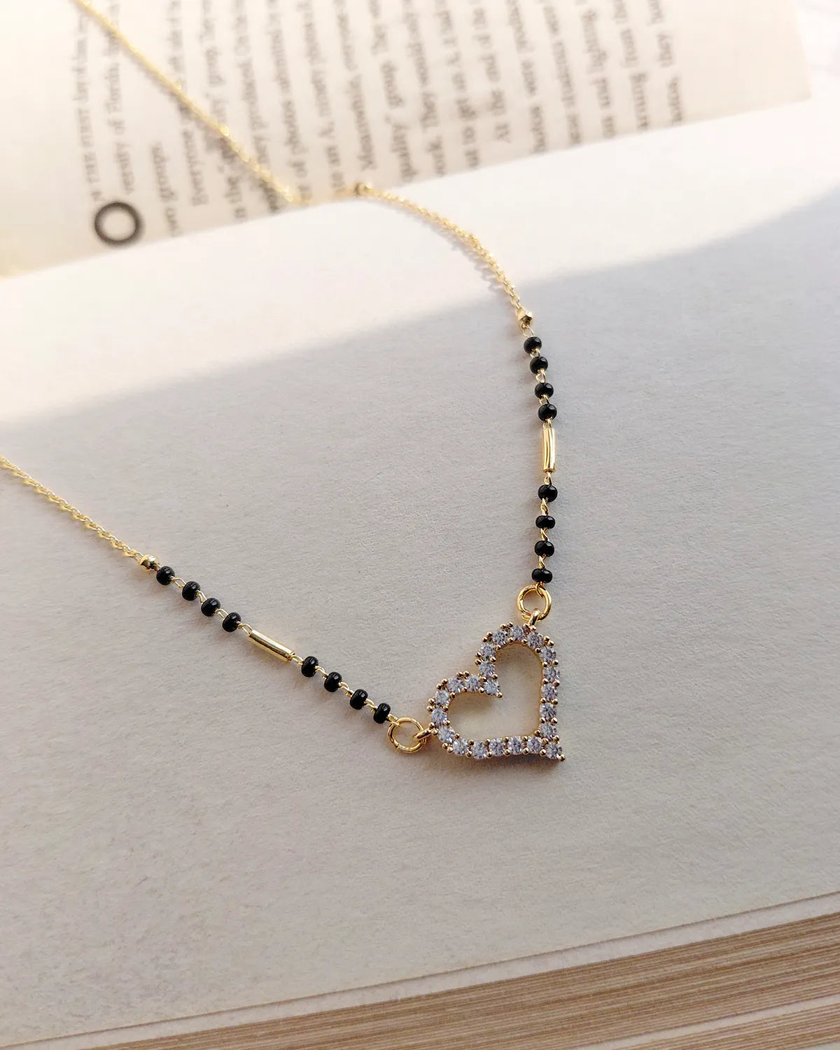 Sparkling heart pendant black bead mangalsutra