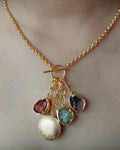 Multistone Gold Charm Necklace worn close-up