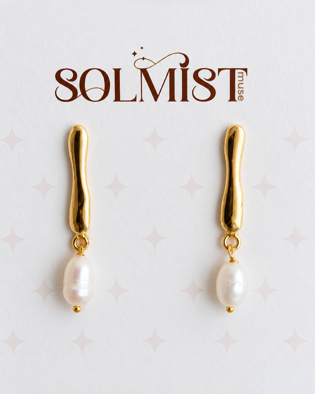Solmist Muse gold and pearl earrings close-up