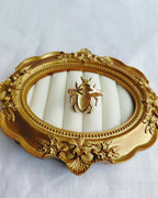 Pink stone scarab gold plated ring back view