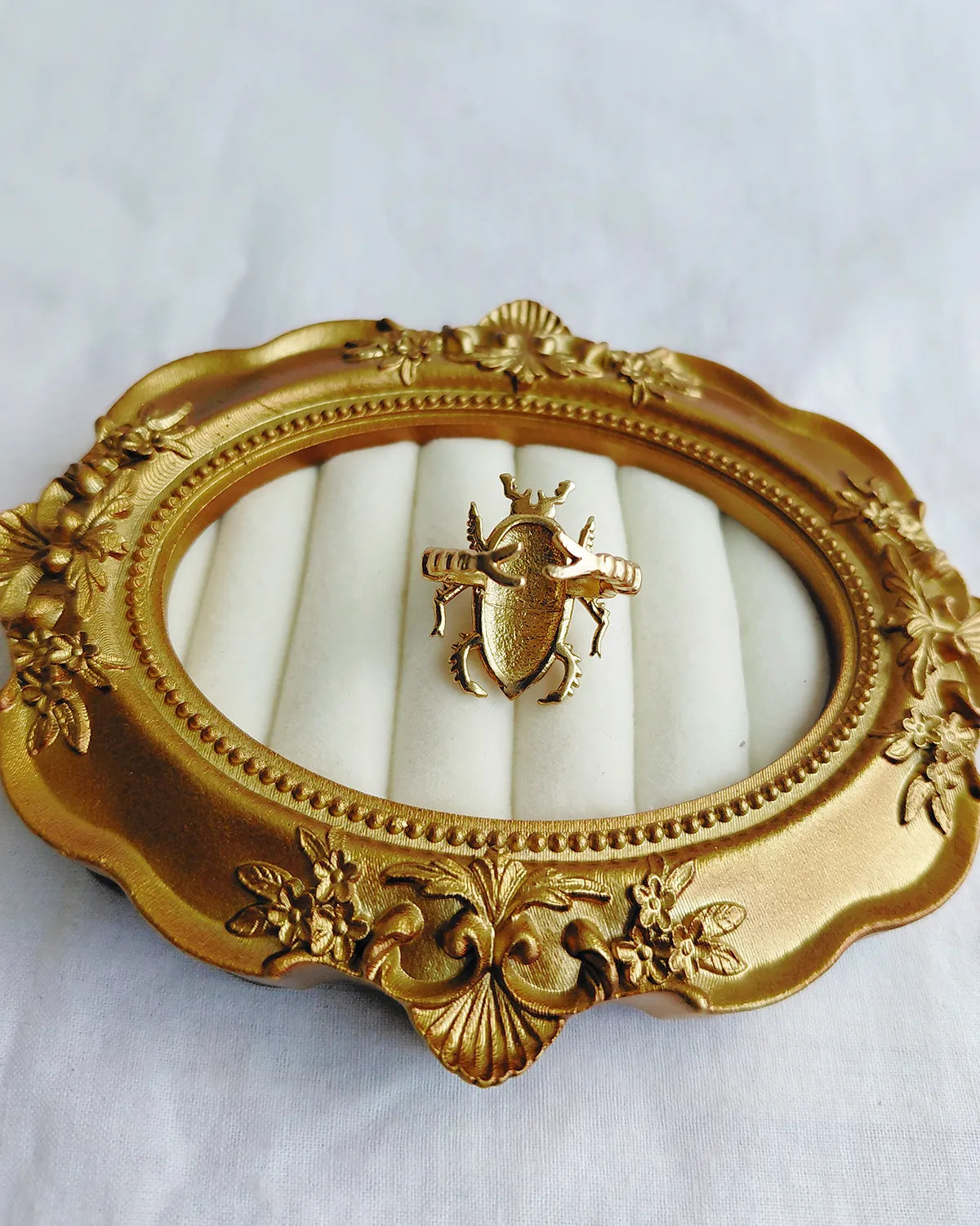 Pink stone scarab gold plated ring back view