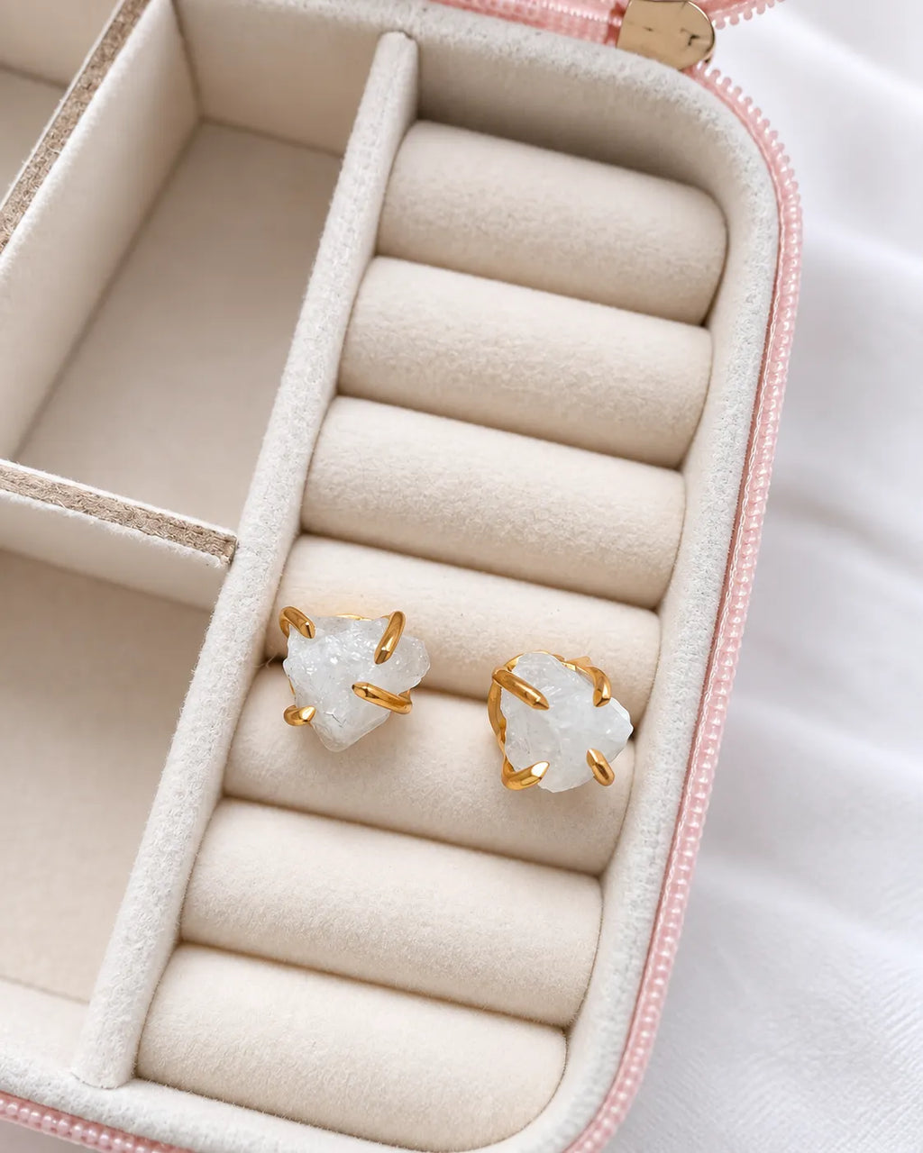 Raw white crystal gold stud earrings in velvet jewelry box