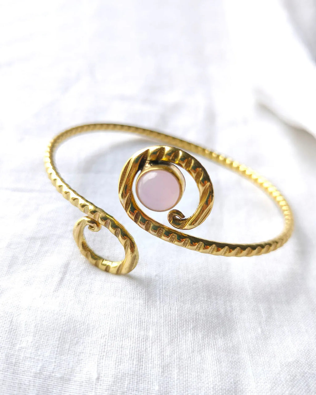 Rose quartz spiral gold cuff bracelet front view