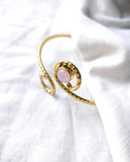 Rose quartz spiral gold cuff bracelet close-up