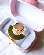 Rose quartz gold statement ring close-up