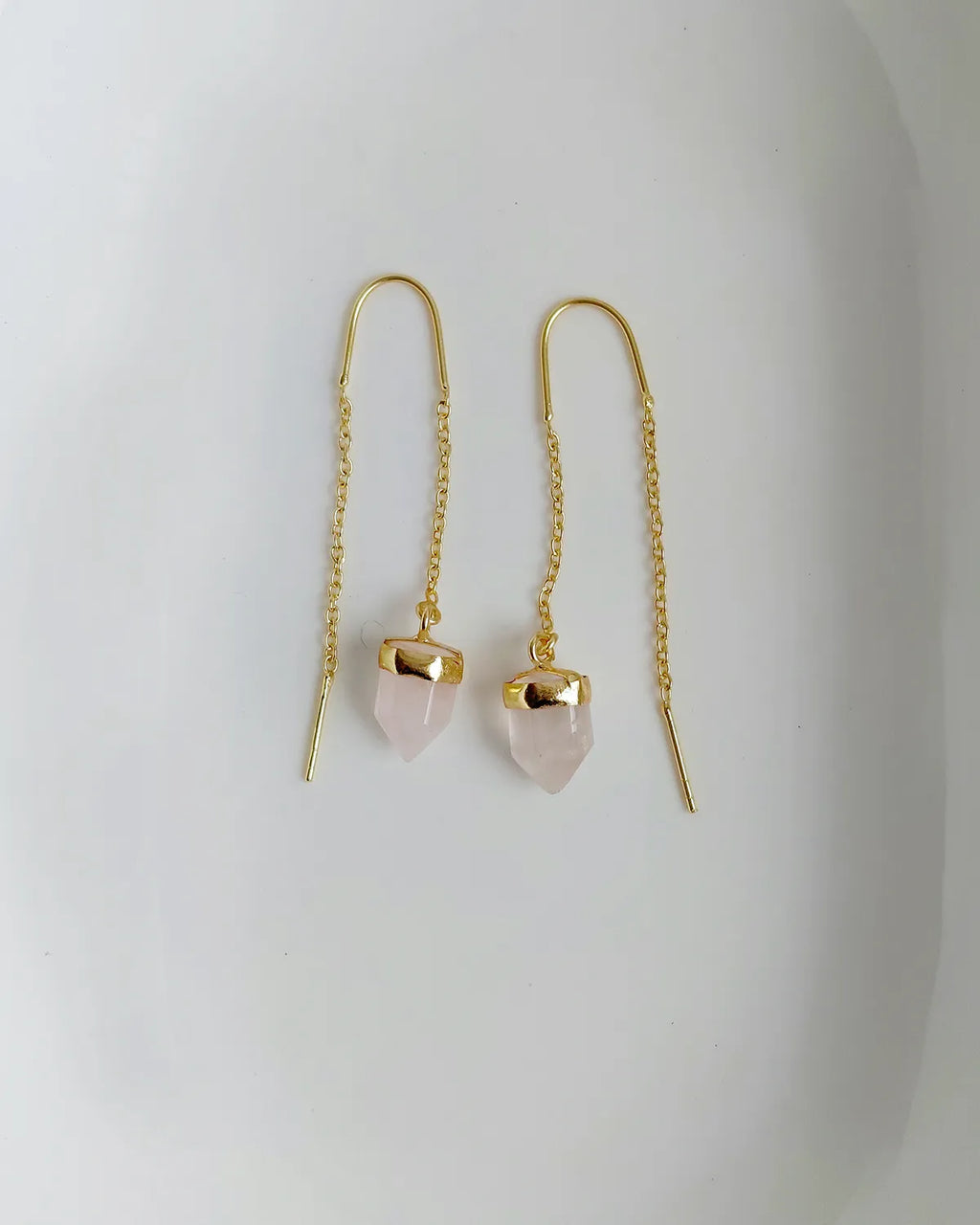 Rose Quartz threader earrings pair on white background