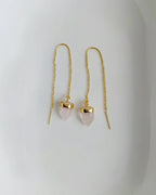 Rose Quartz threader earrings pair on white background