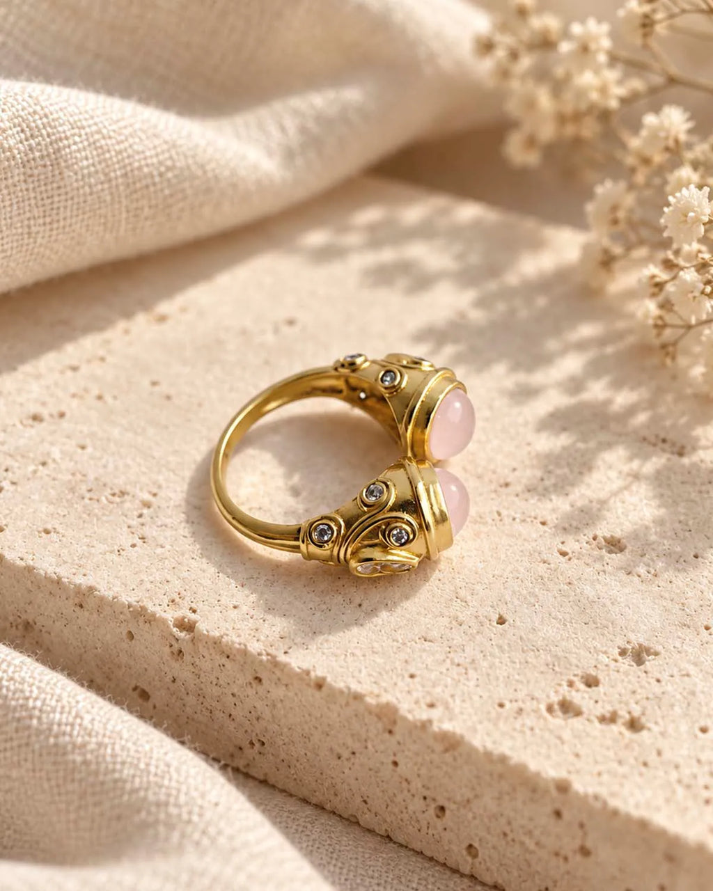 Gold plated twin stone statement ring front angle
