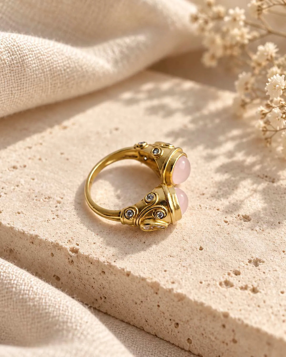 Gold plated twin stone statement ring front angle