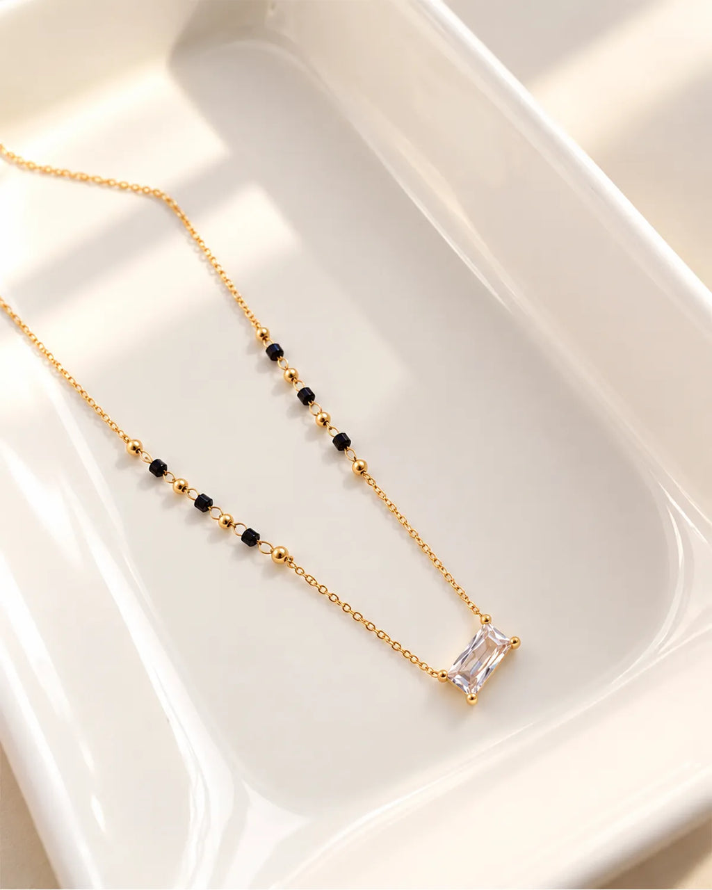 Emerald cut crystal-style pendant mangalsutra with black and gold beads