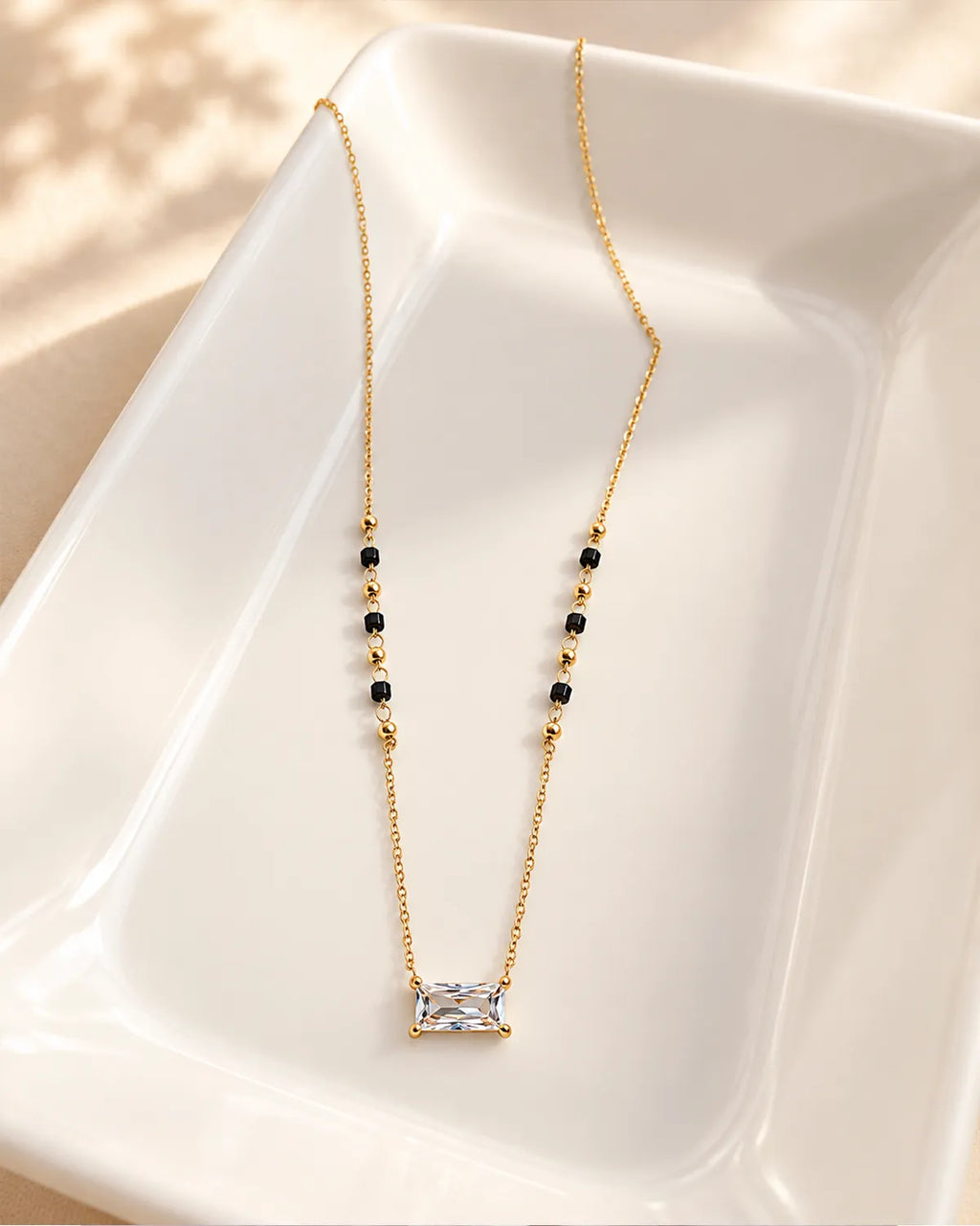 Emerald cut crystal-style pendant mangalsutra with black and gold beads
