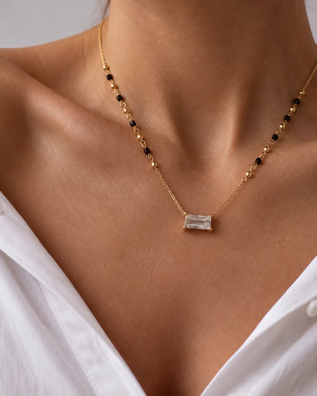 Emerald cut crystal-style pendant mangalsutra with black and gold beads
