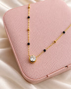 Solitaire round stone pendant mangalsutra with black and gold beads