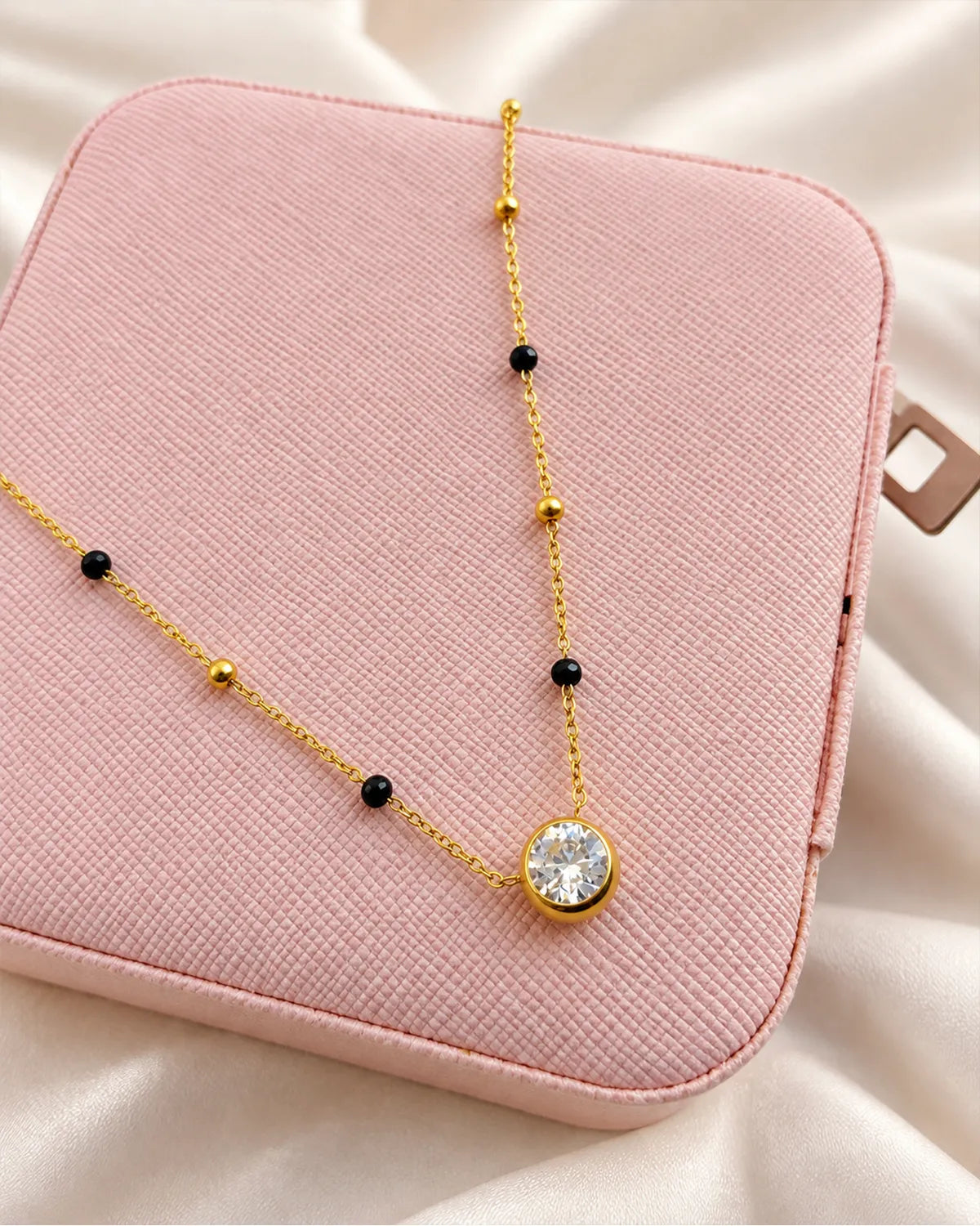 Solitaire round stone pendant mangalsutra with black and gold beads