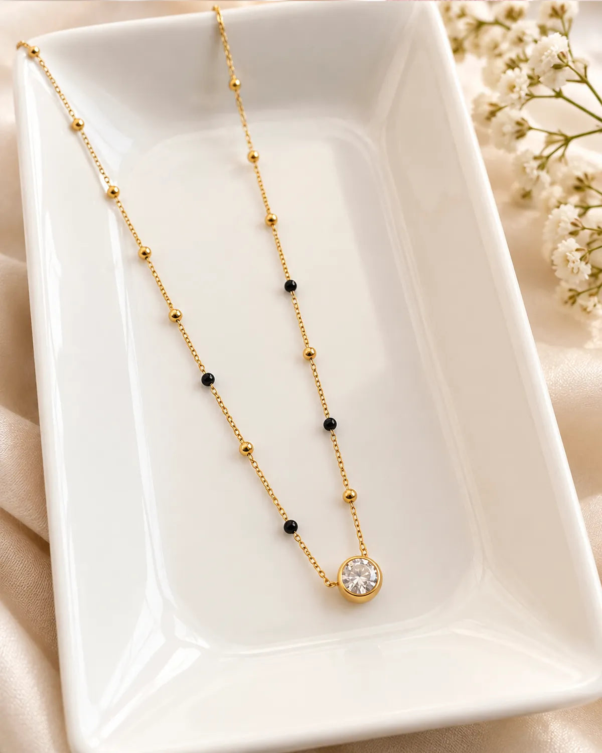 Solitaire round stone pendant mangalsutra with black and gold beads
