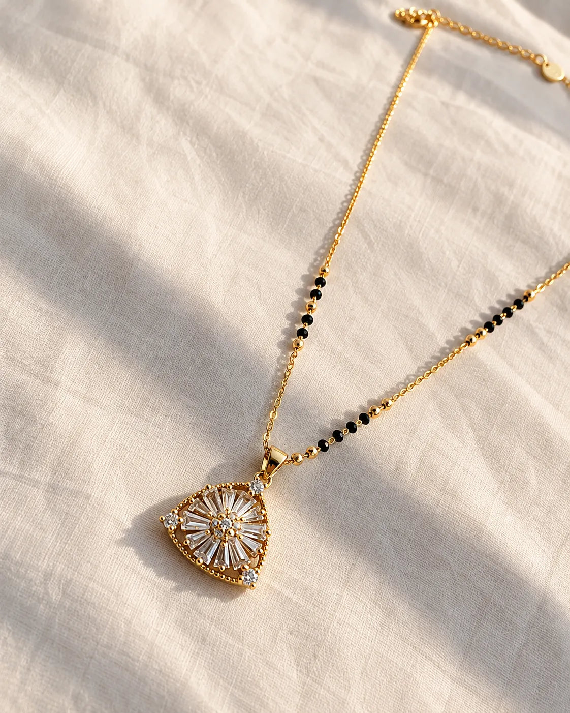Sunburst floral motif triangular pendant black bead mangalsutra necklace