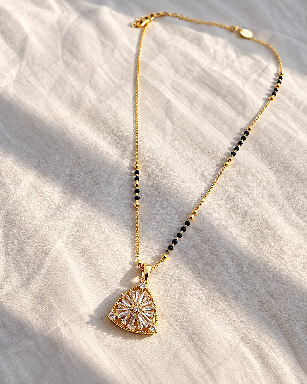 Sunburst floral motif triangular pendant black bead mangalsutra necklace