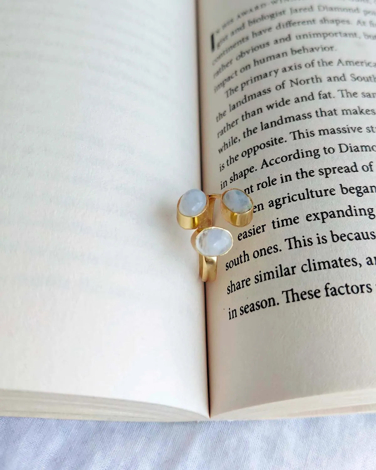 Triple stone gold plated ring front view