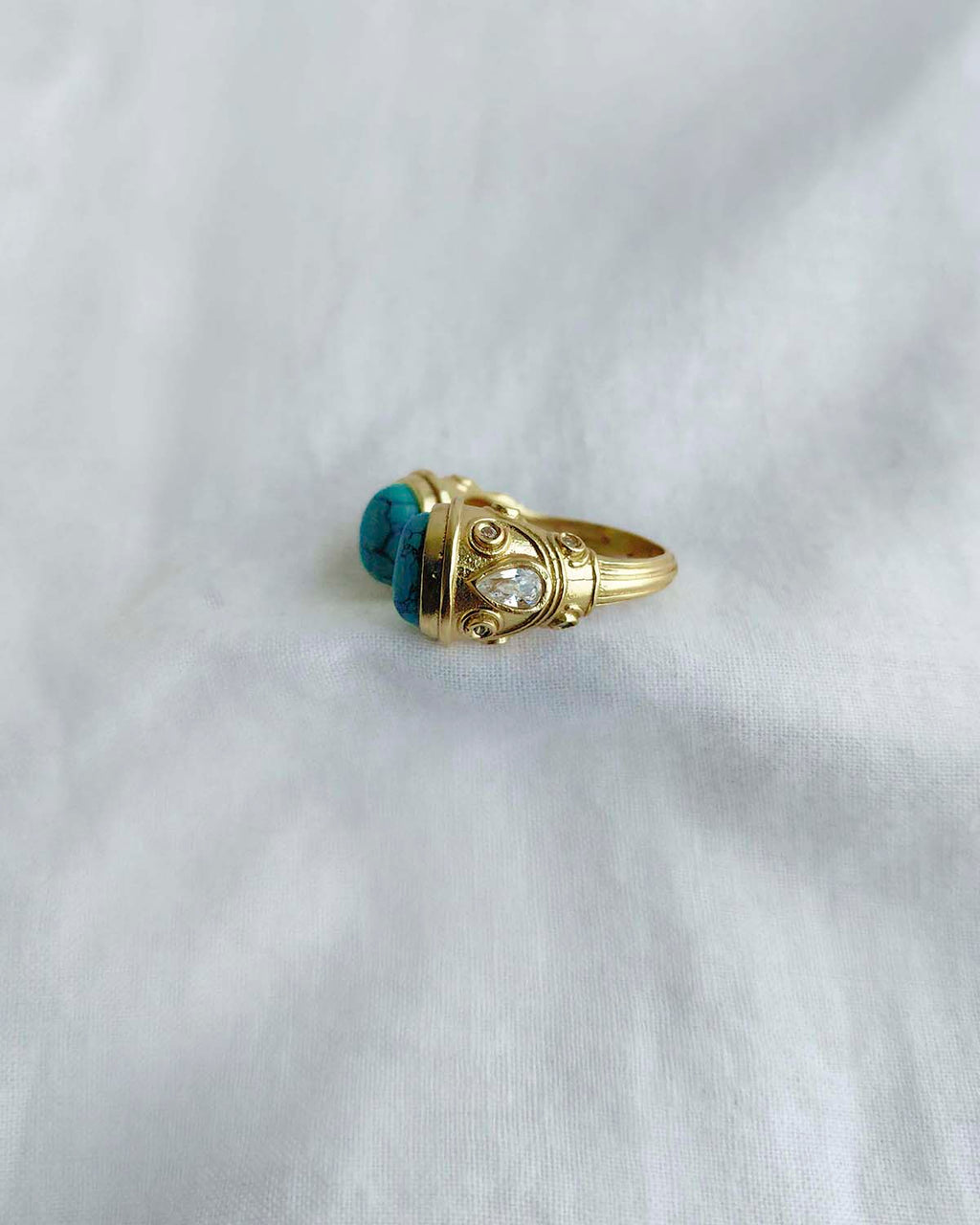 Turquoise double stone gold plated ring side view